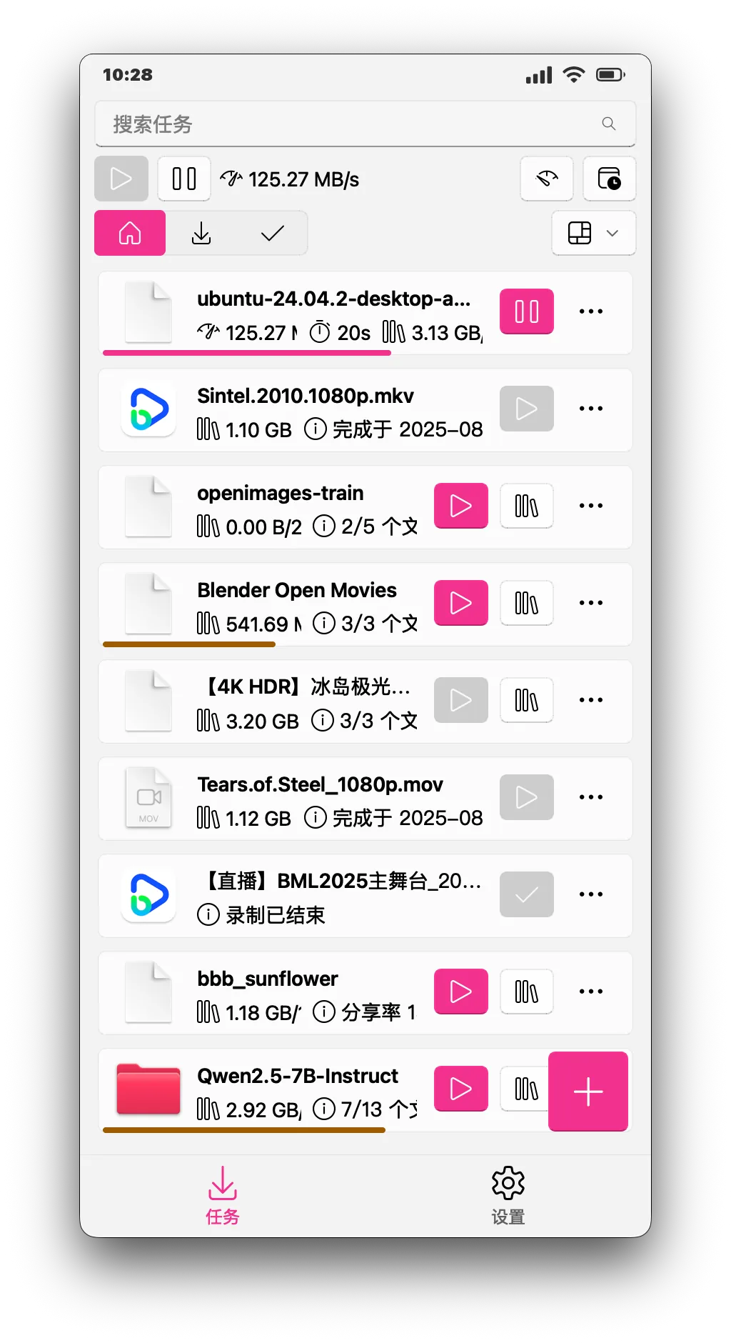 Ghost Downloader Android 版的下載任務清單：搜尋列、即時速度與多筆下載任務的進度、檔案大小與操作按鈕，右下角為新增任務的浮動按鈕